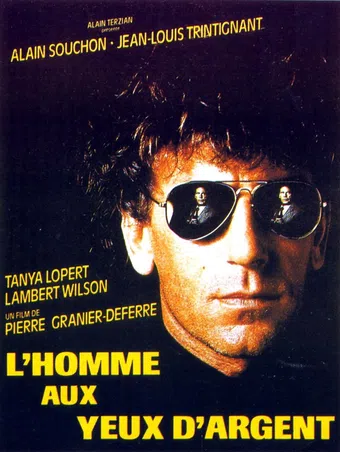 l'homme aux yeux d'argent 1985 poster